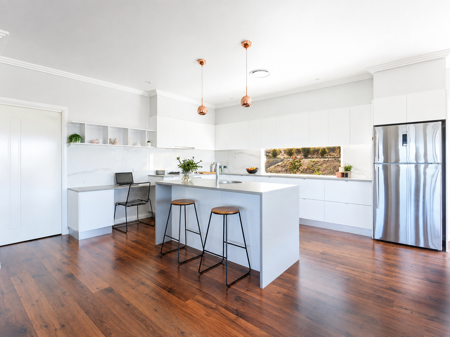 Renovated kitchen with island bench.